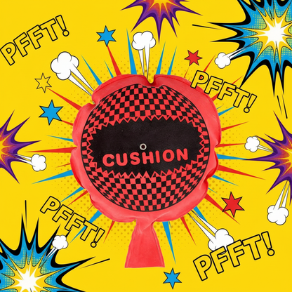 Red whoopee cushion on a bright yellow background with comic-style prank graphics